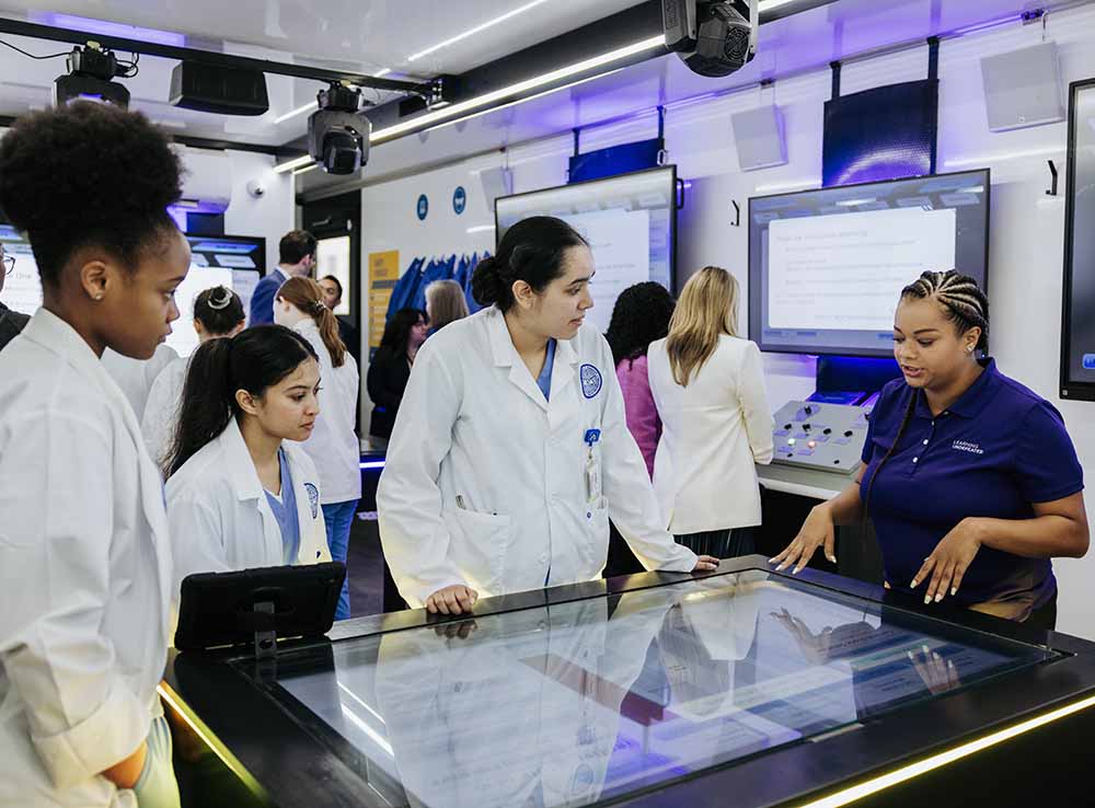 Students exploring biomanufacturing through hands-on learning in the mobile laboratory.