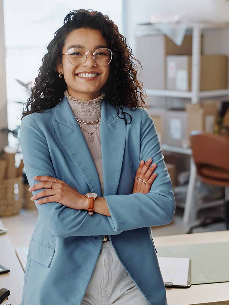 female entrepreneur smiling at camera